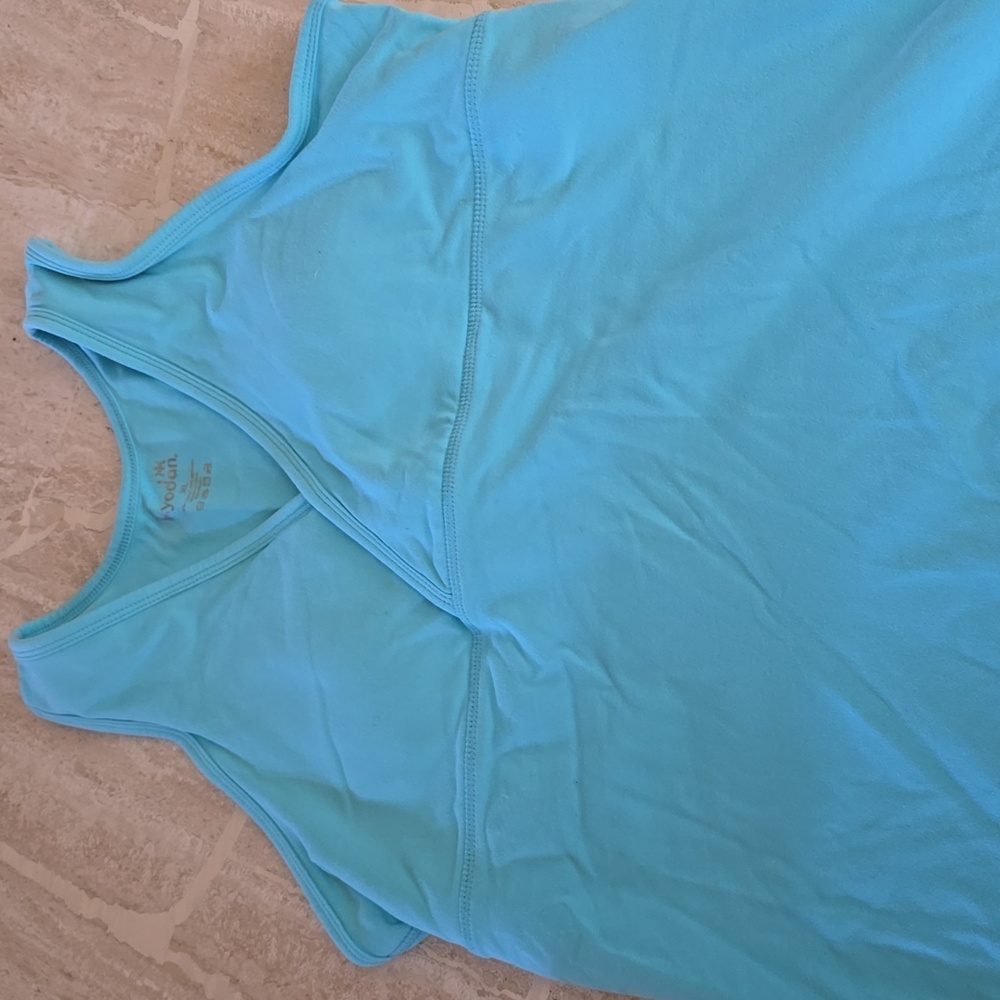 Empire waist athletic top with built in bra. Never worn.